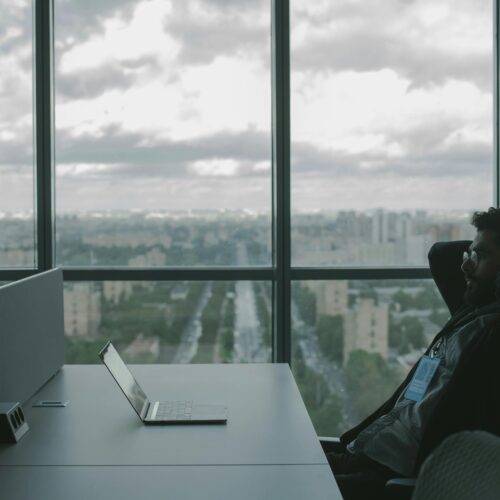 man sitting at desk