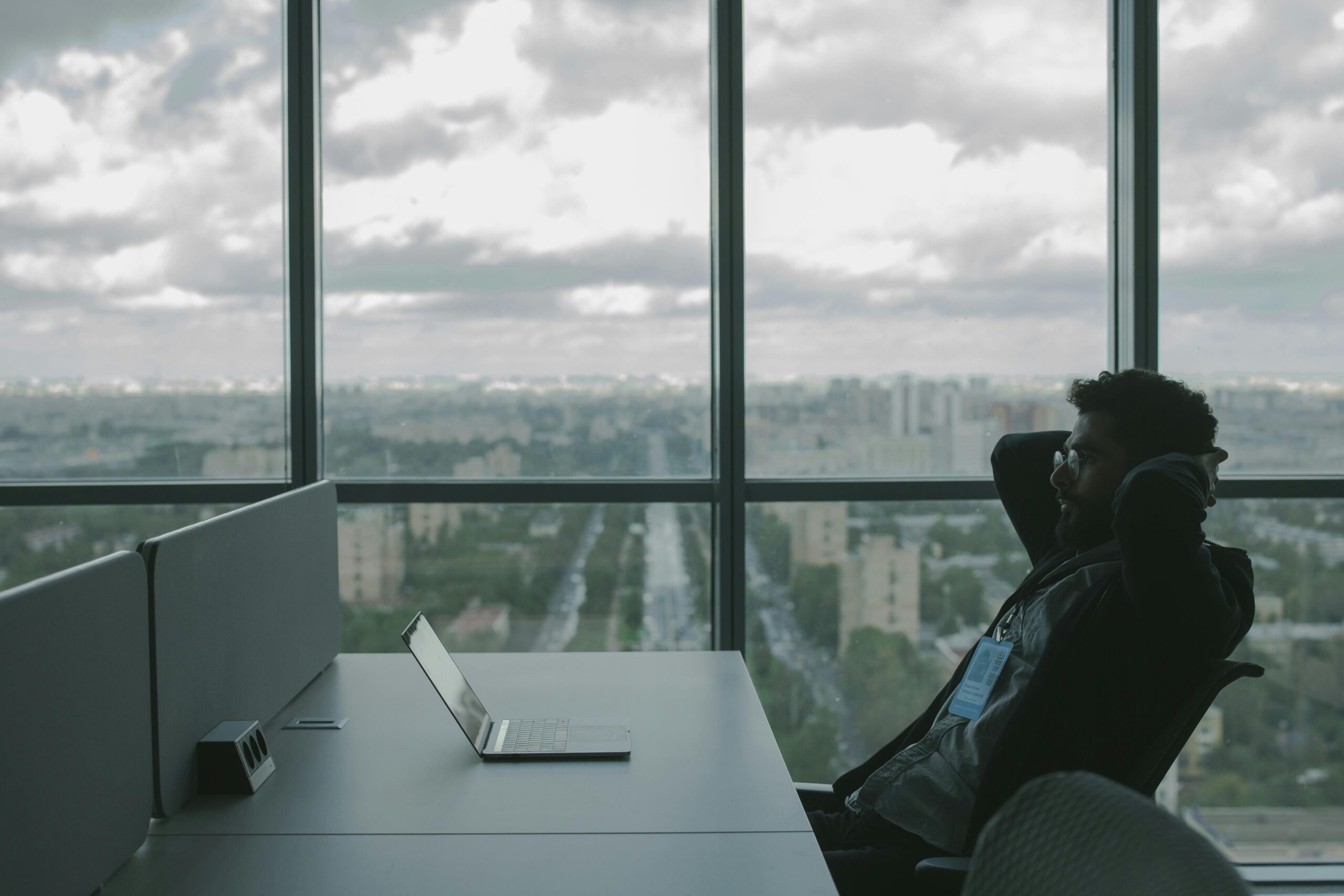 man sitting at desk